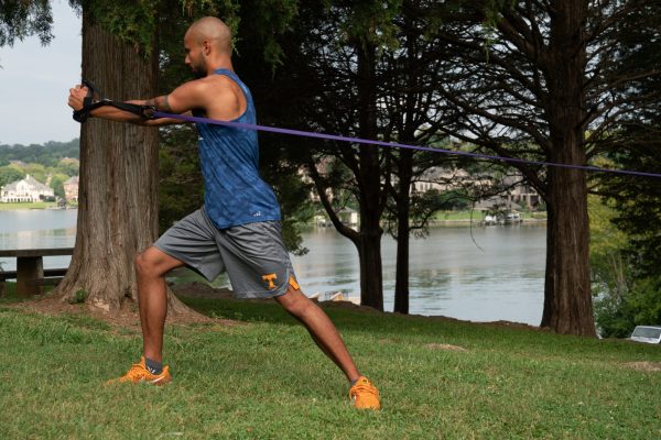 man working out using resistance bands